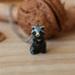 Raccoon necklace in a nutshell box