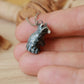 Raccoon necklace in a nutshell box