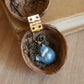 Sleeping starry wolf necklace in a nutshell box