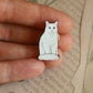 White cat pin