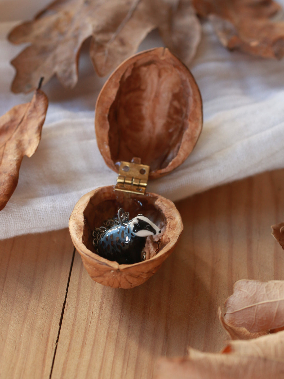 Badger necklace - walnut box