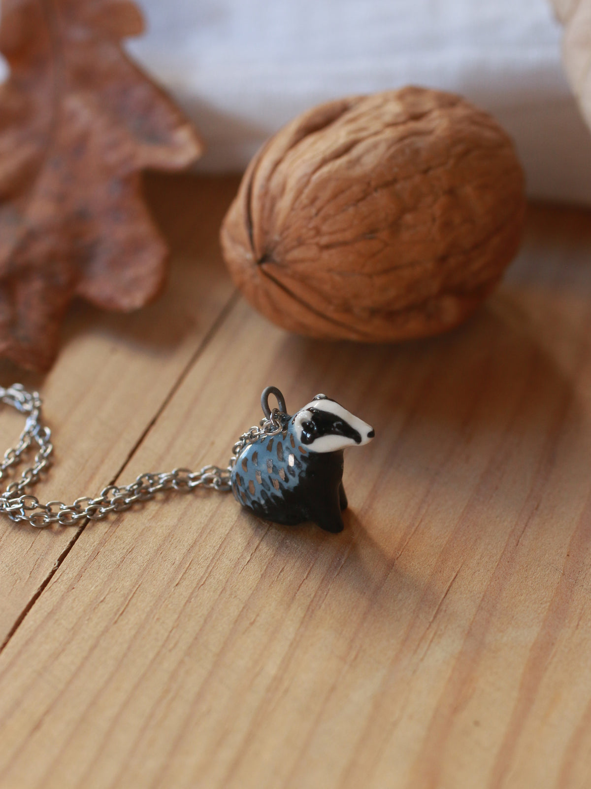 Badger necklace - walnut box