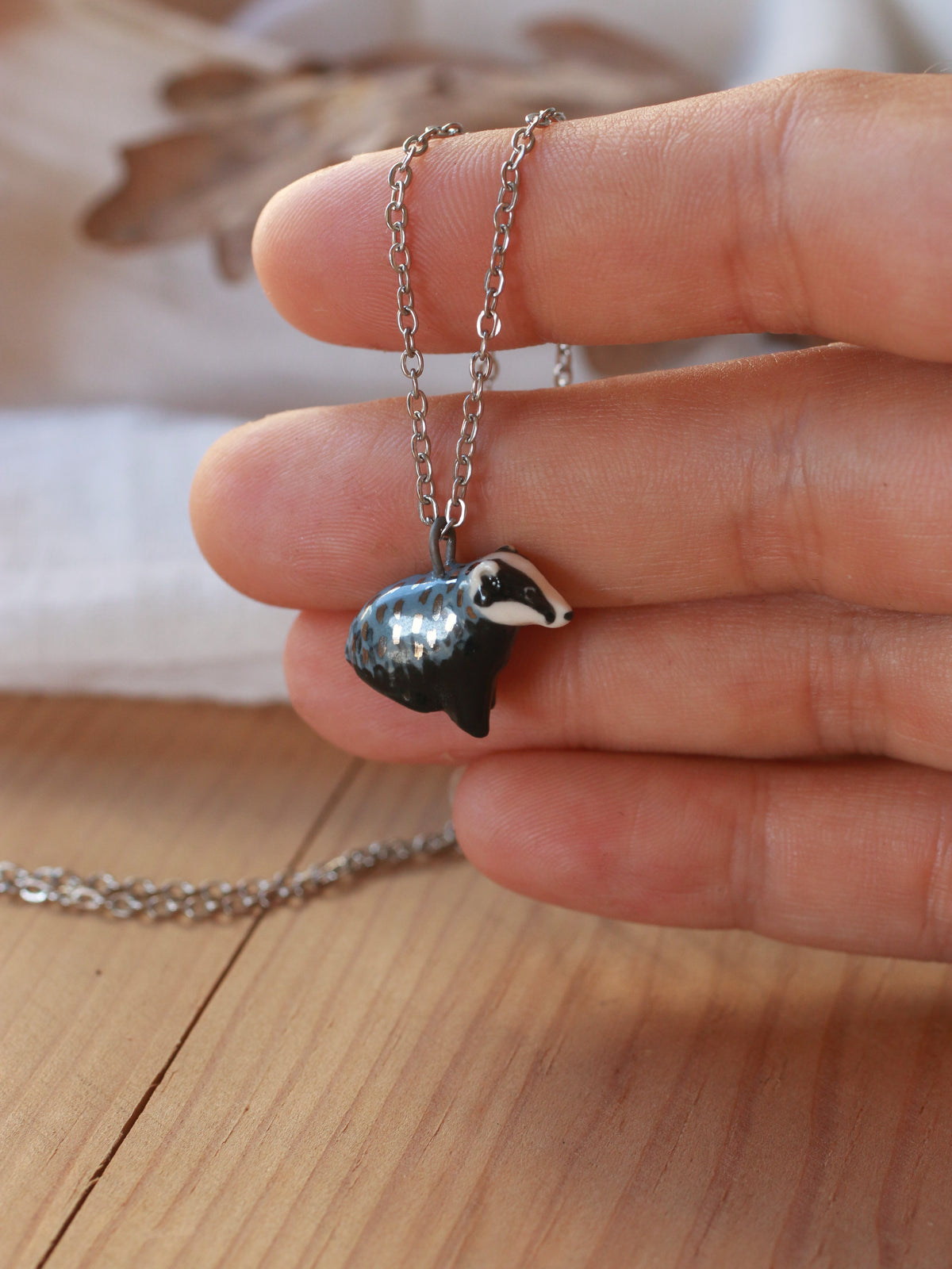 Badger necklace - walnut box