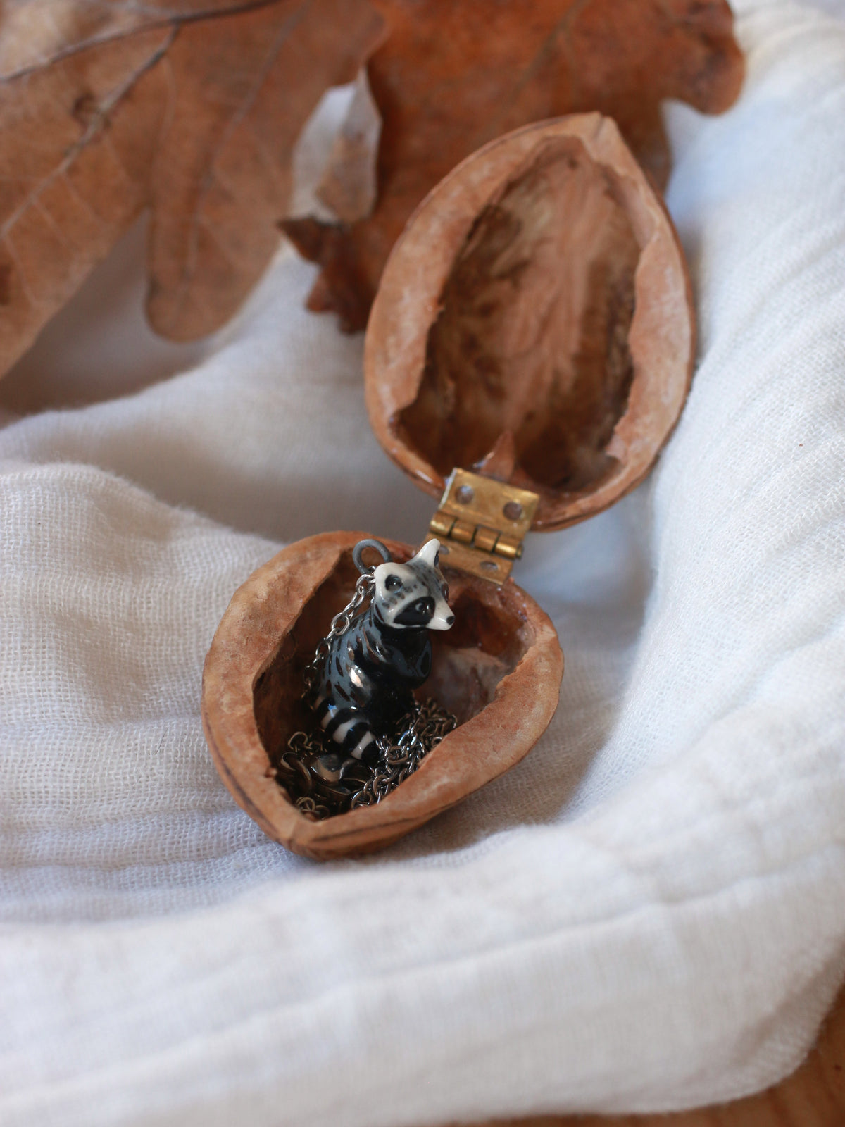 Raccoon necklace - nutshell box
