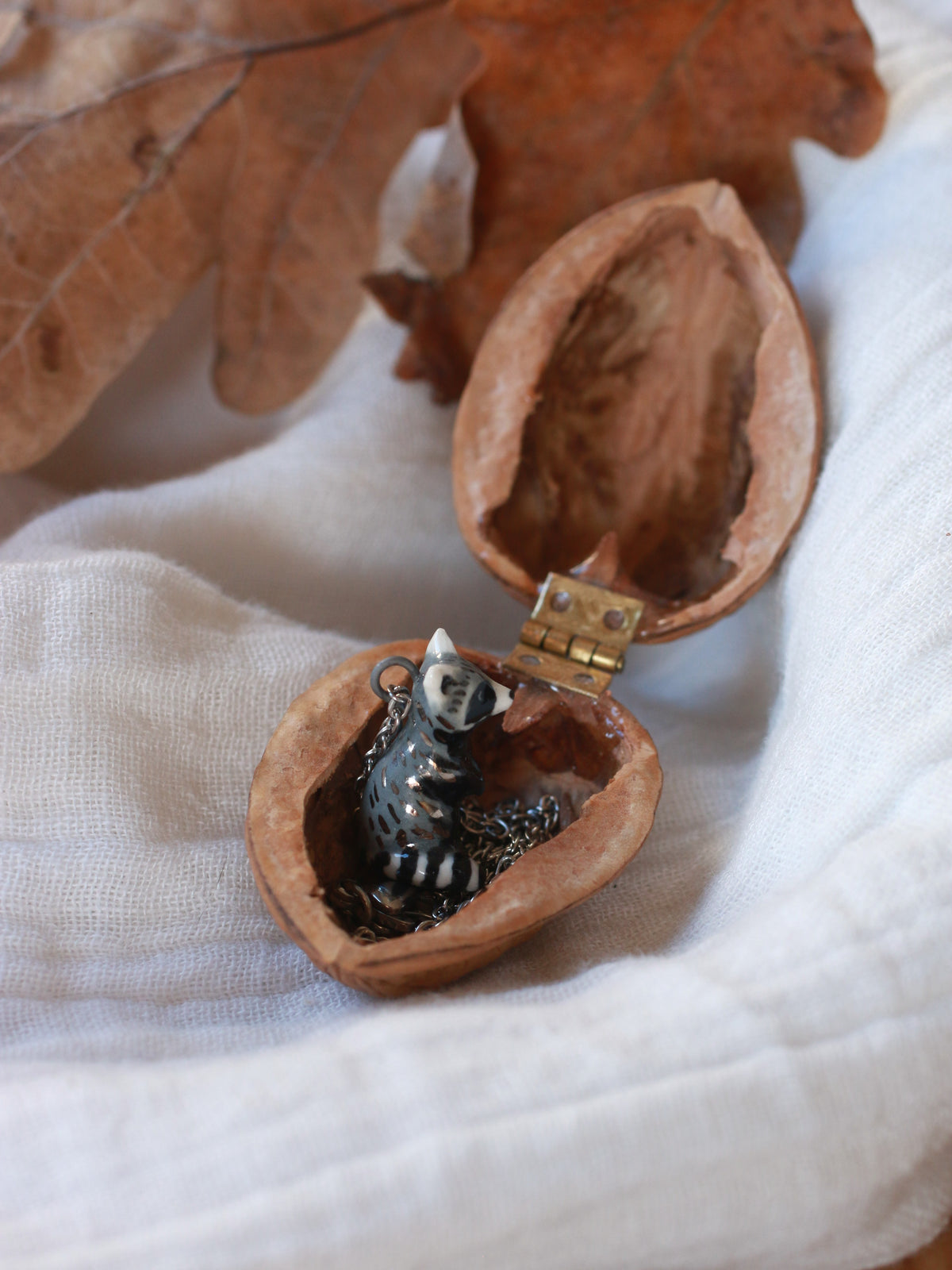 Raccoon necklace - nutshell box