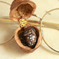 Sleeping Fawn necklace in a walnut box