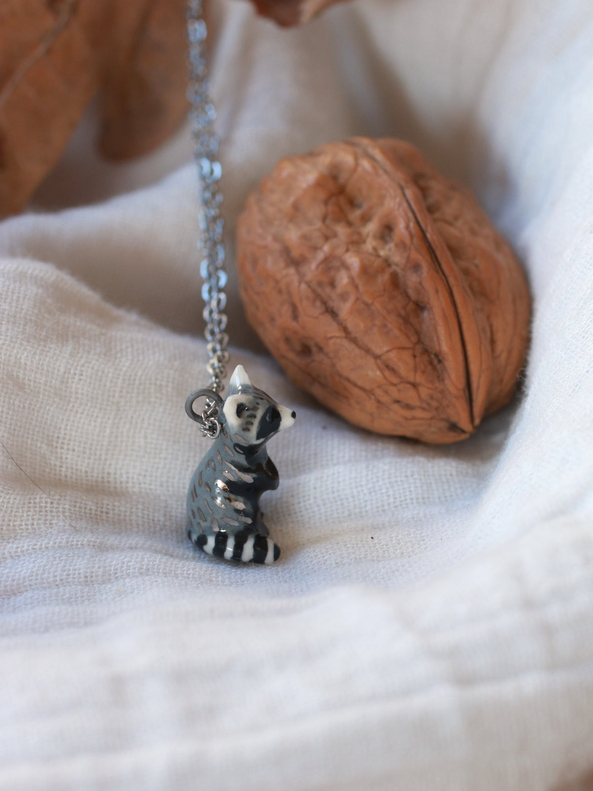 Raccoon necklace - nutshell box