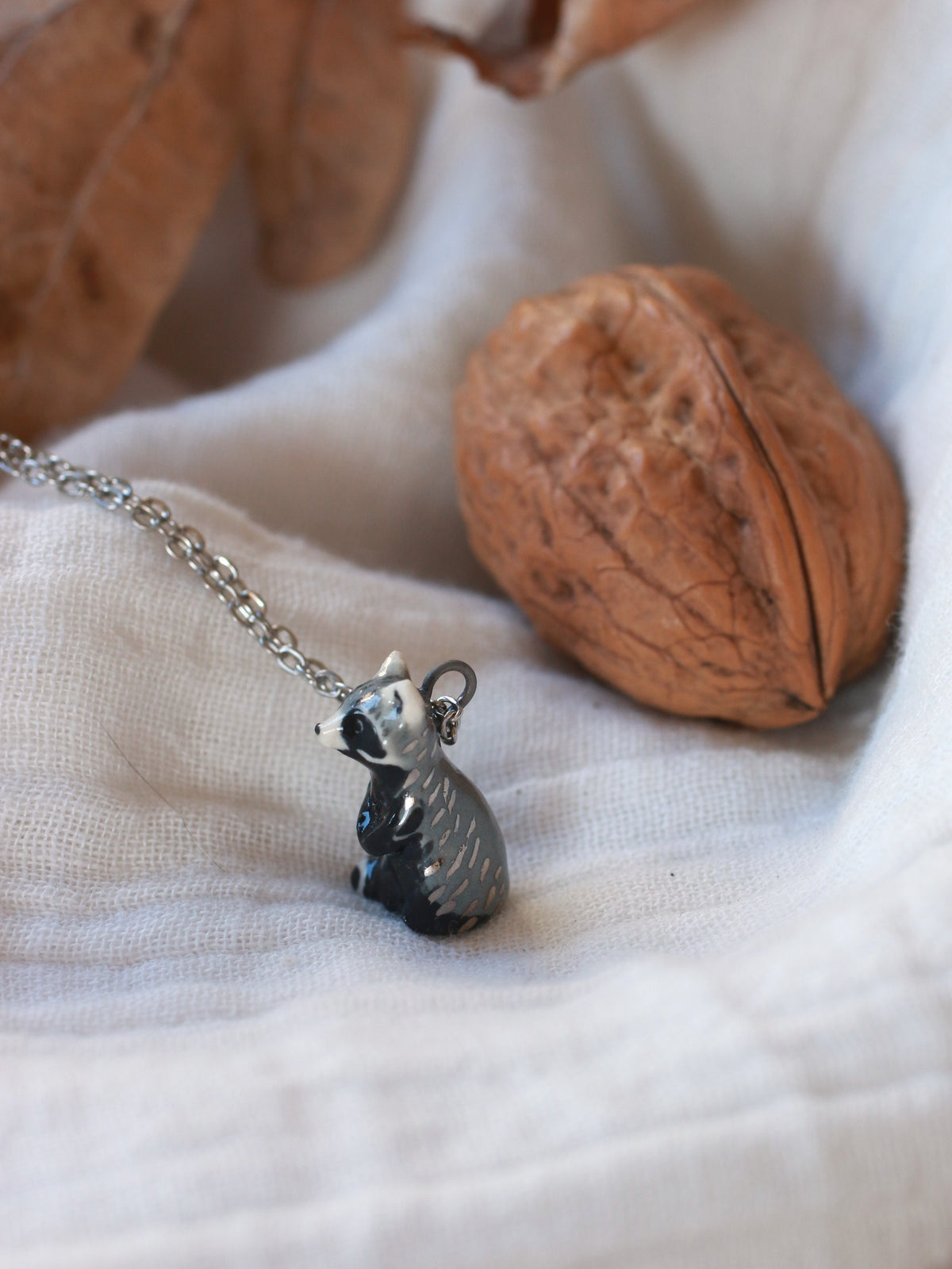 Raccoon necklace - nutshell box