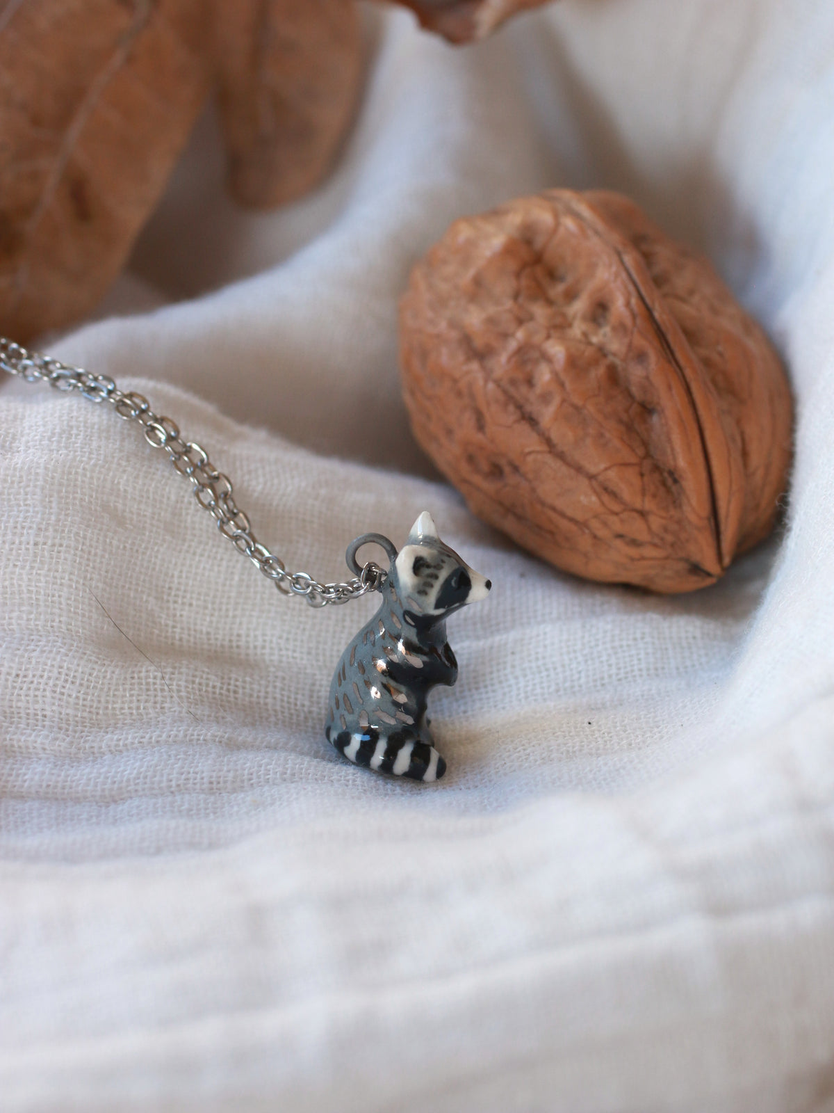 Raccoon necklace - nutshell box