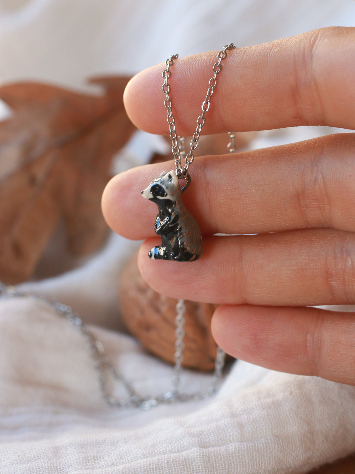 Raccoon necklace - nutshell box