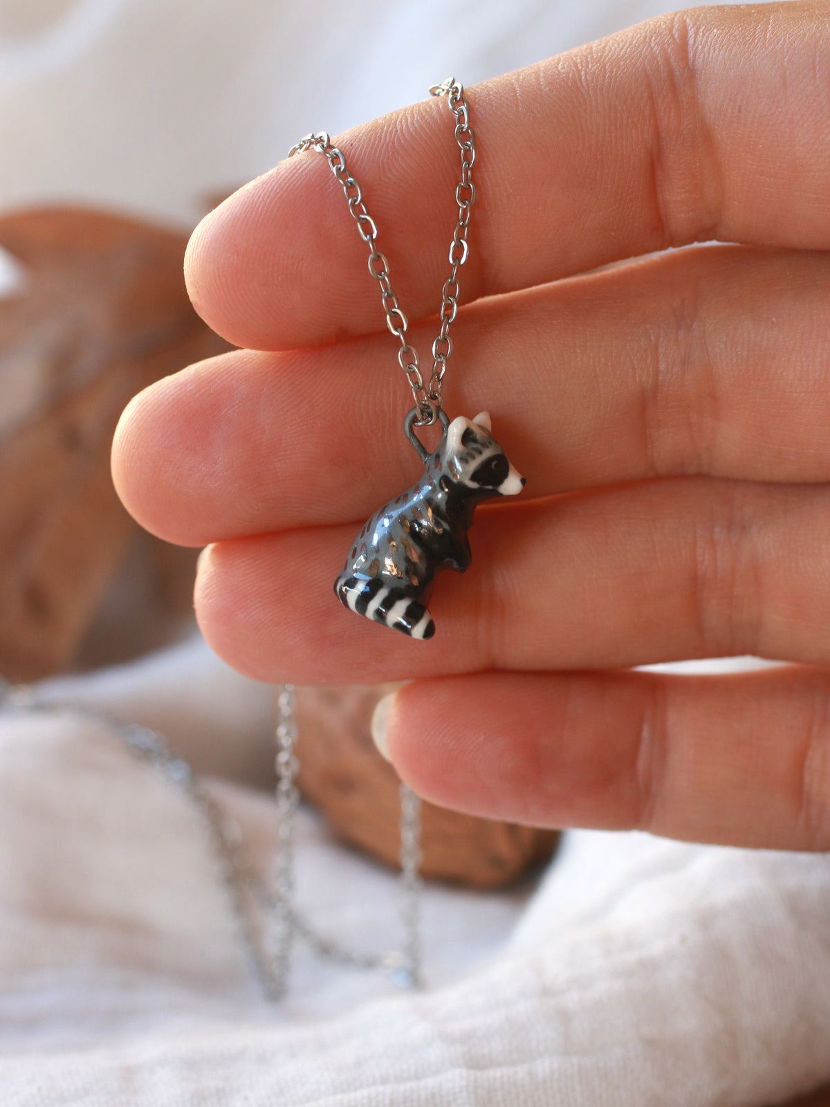 Raccoon necklace - nutshell box