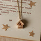 Bird house necklace