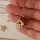 Bird house necklace