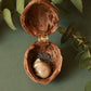 Sleeping bunny necklace in a walnut box