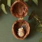 Sleeping bunny necklace in a walnut box