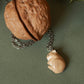 Sleeping bunny necklace in a walnut box