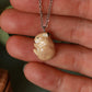 Sleeping bunny necklace in a walnut box