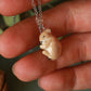 Sleeping bunny necklace in a walnut box