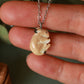 Sleeping bunny necklace in a walnut box