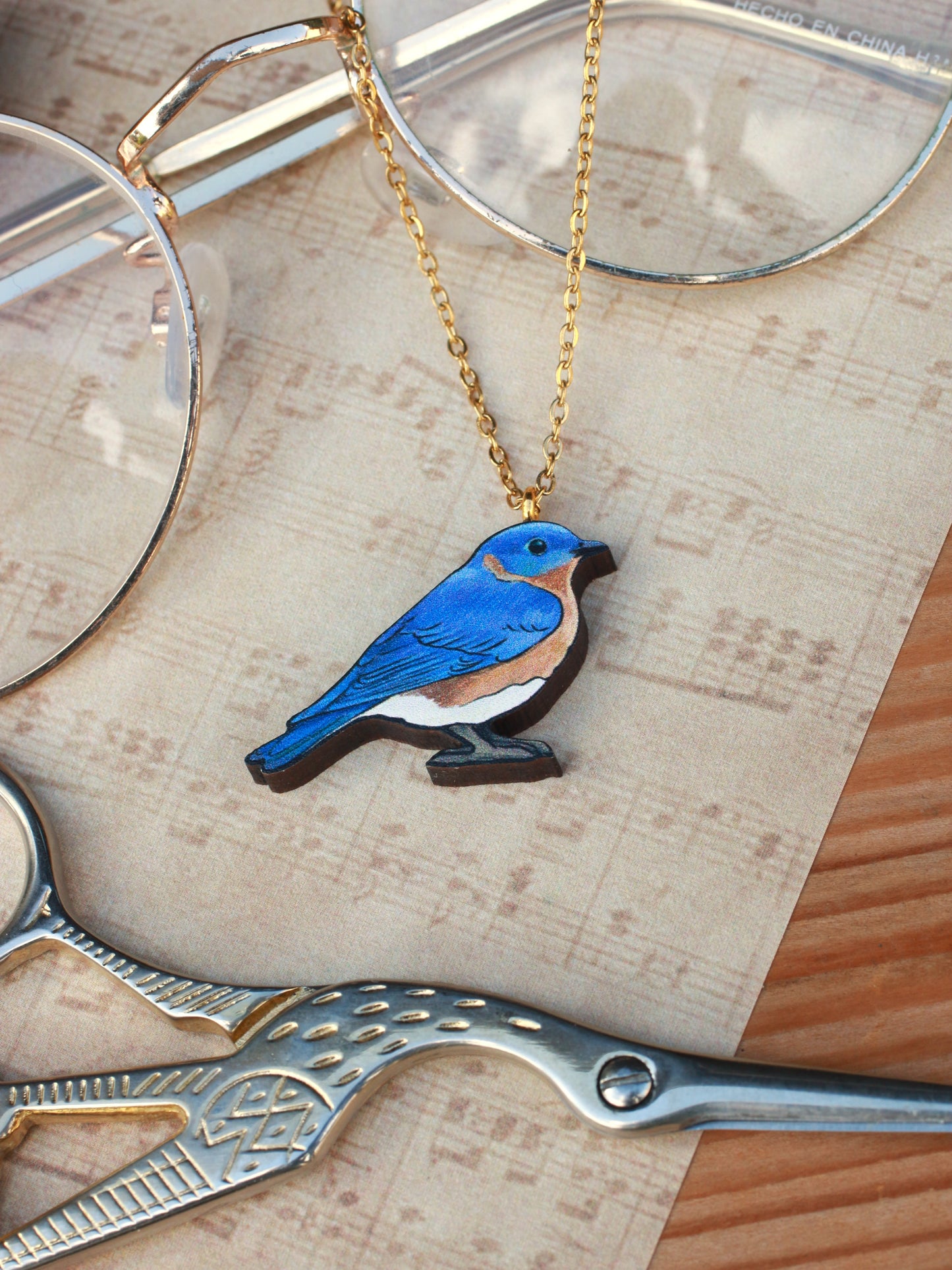 Blue bird necklace