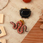 Cauldron and snake pin set