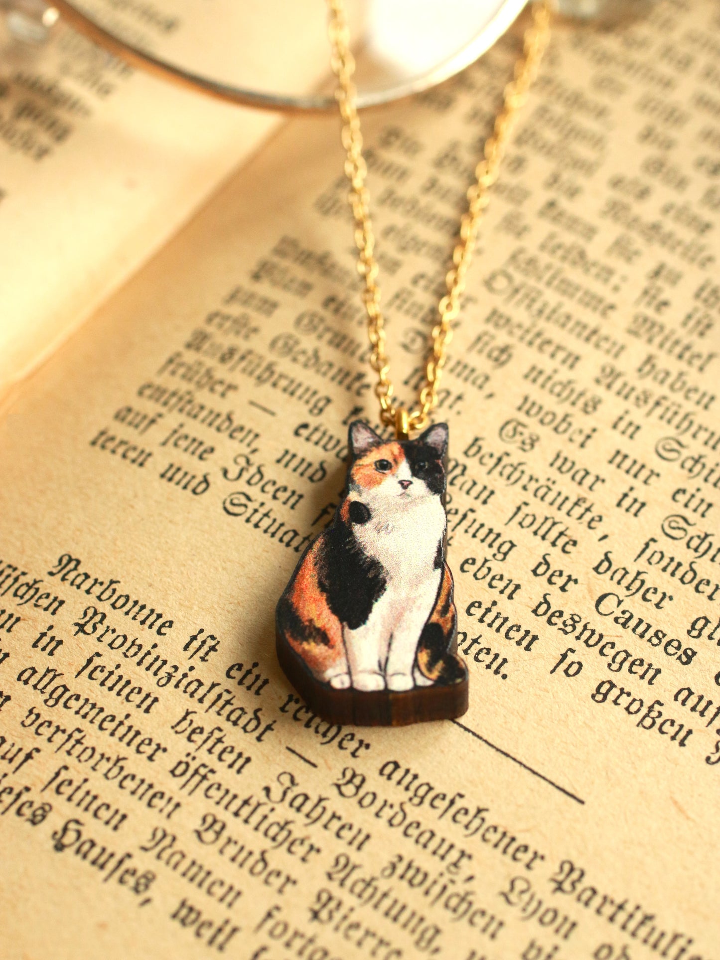 Calico cat necklace