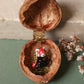Red Panda necklace in a walnut box