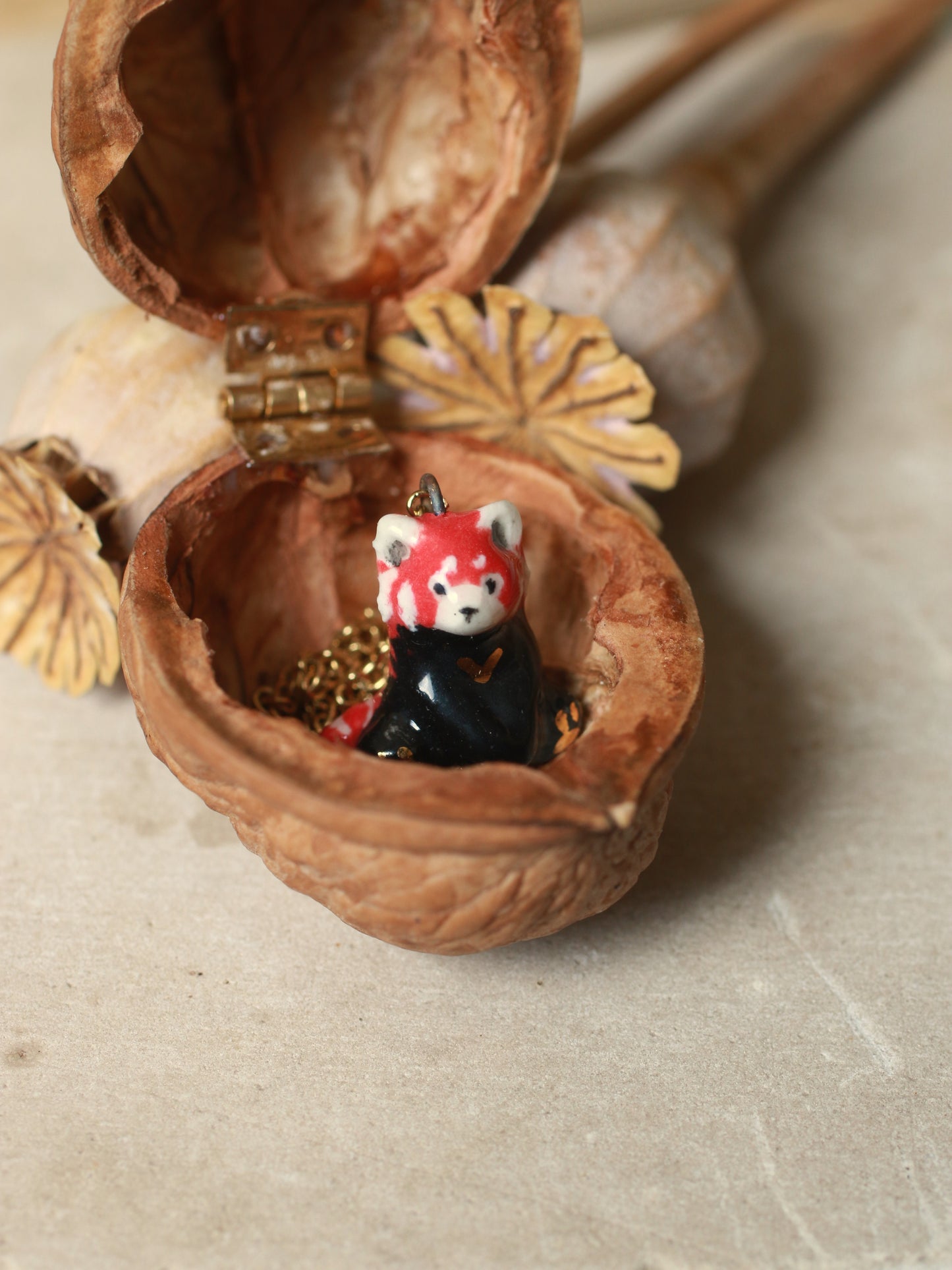 Red Panda necklace in a walnut box