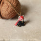 Red Panda necklace in a walnut box