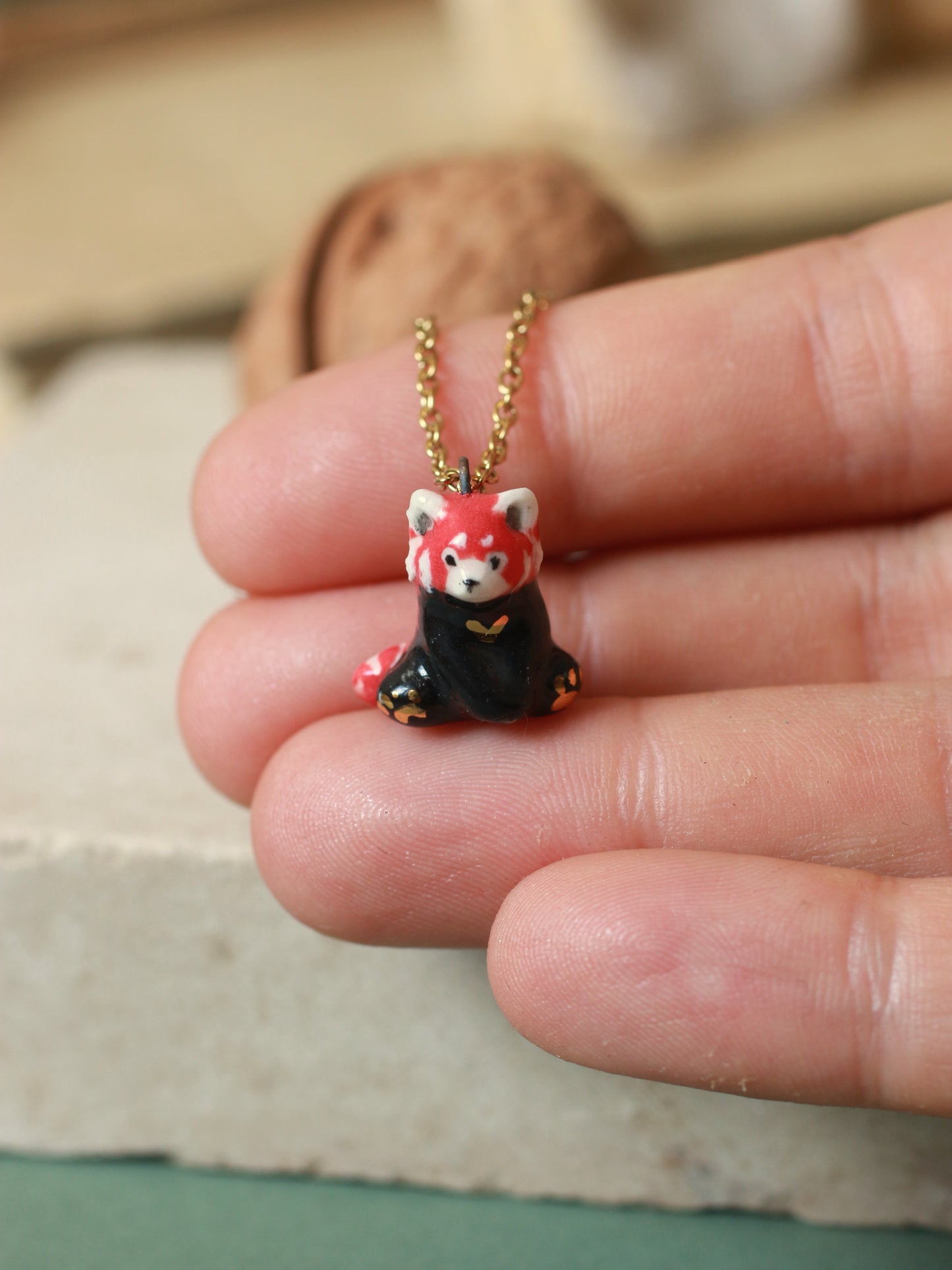 Red Panda necklace in a walnut box
