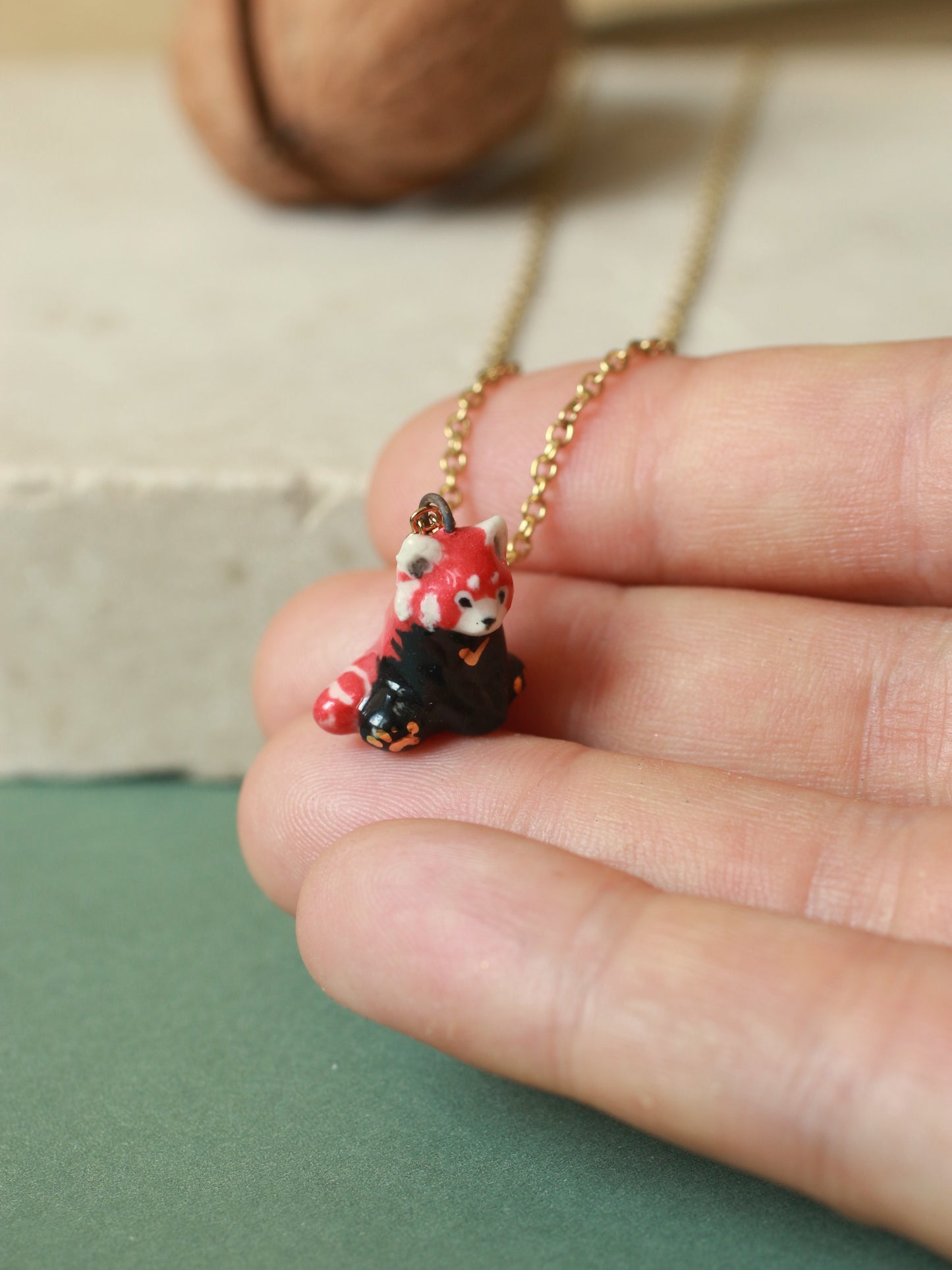 Red Panda necklace in a walnut box