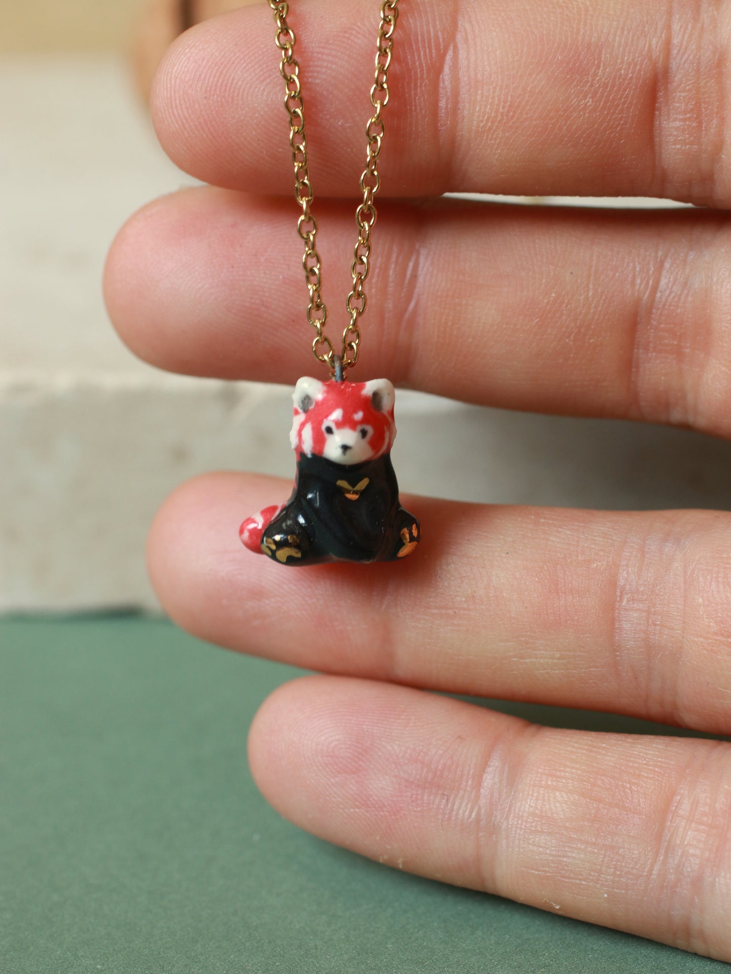 Red Panda necklace in a walnut box