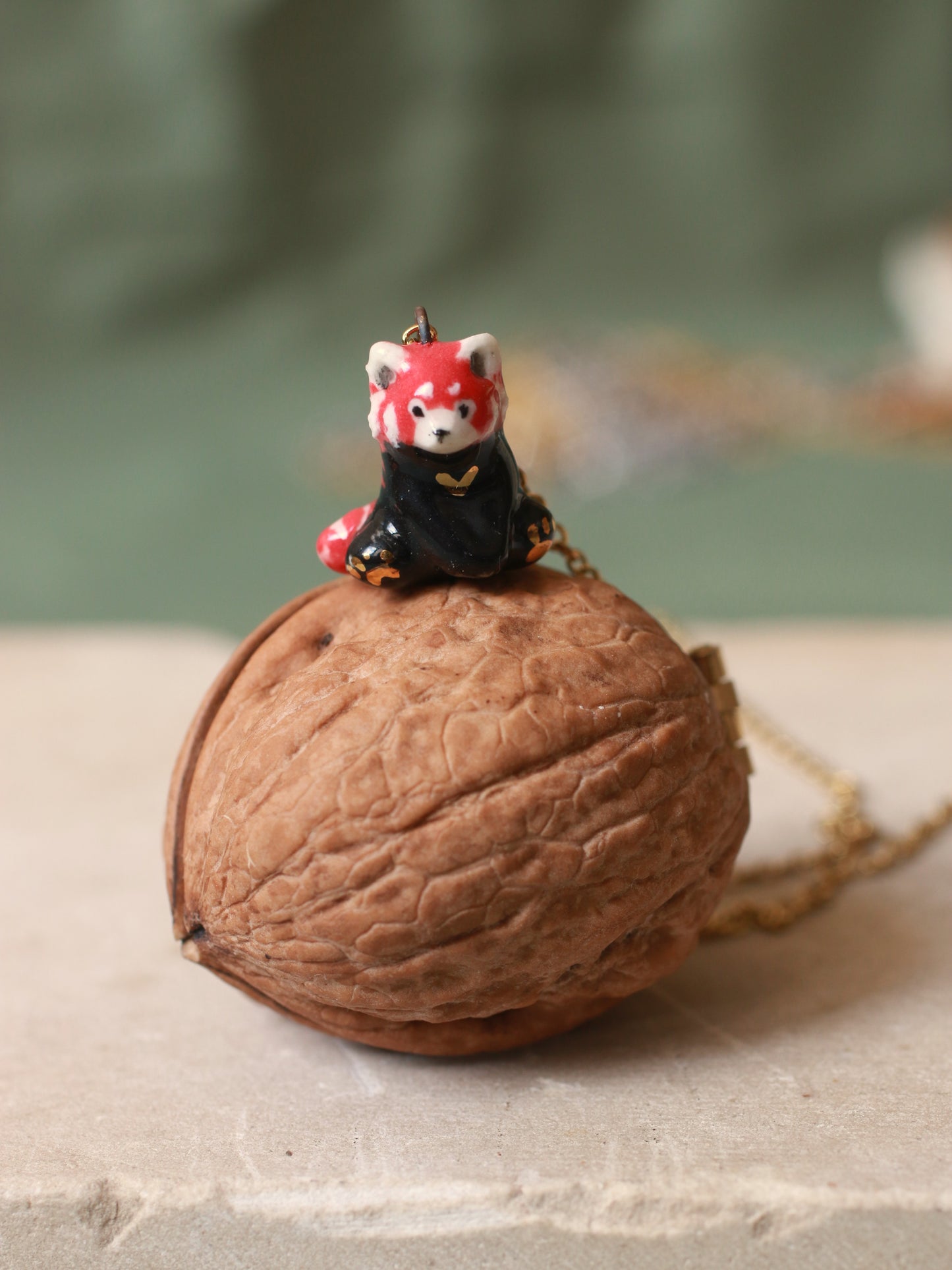 Red Panda necklace in a walnut box