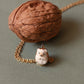 Hedgehog necklace in a walnut box