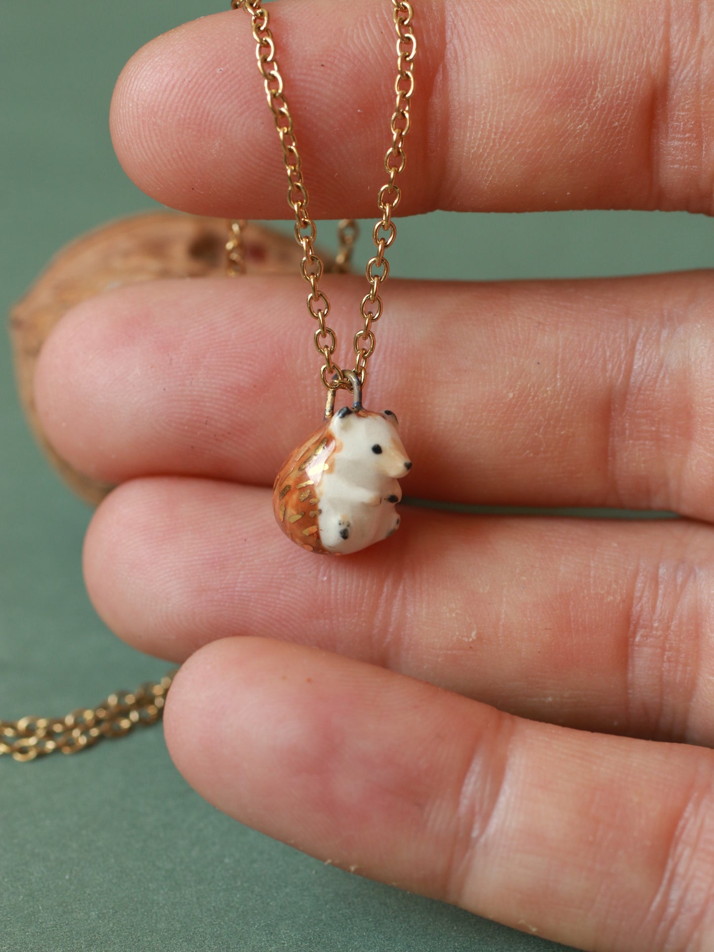 Hedgehog necklace in a walnut box