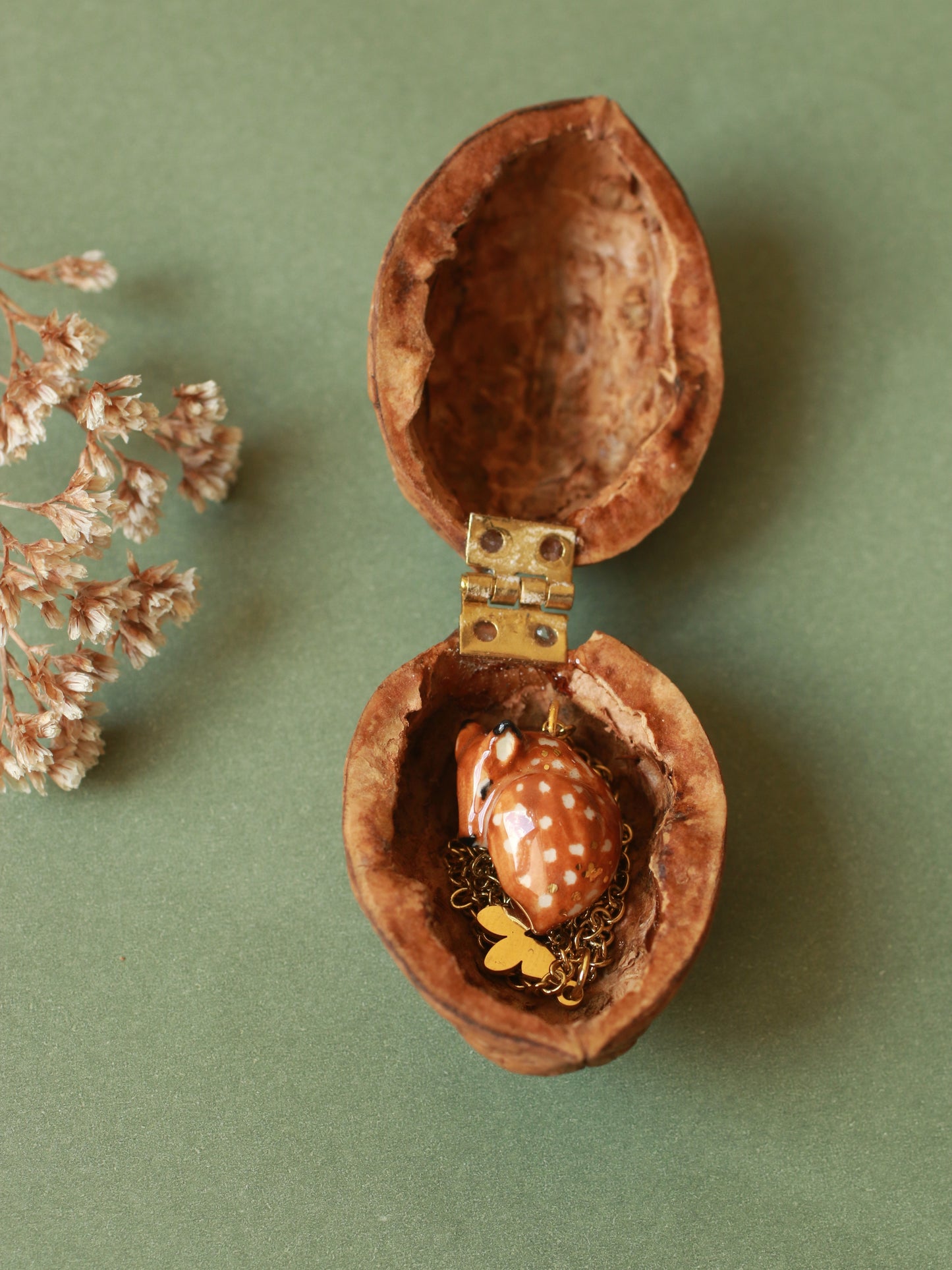 Sleeping Fawn necklace in a walnut box