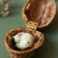 Sleeping cat necklace in a walnut box