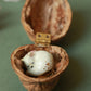 Sleeping cat necklace in a walnut box