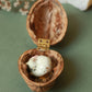 Sleeping cat necklace in a walnut box