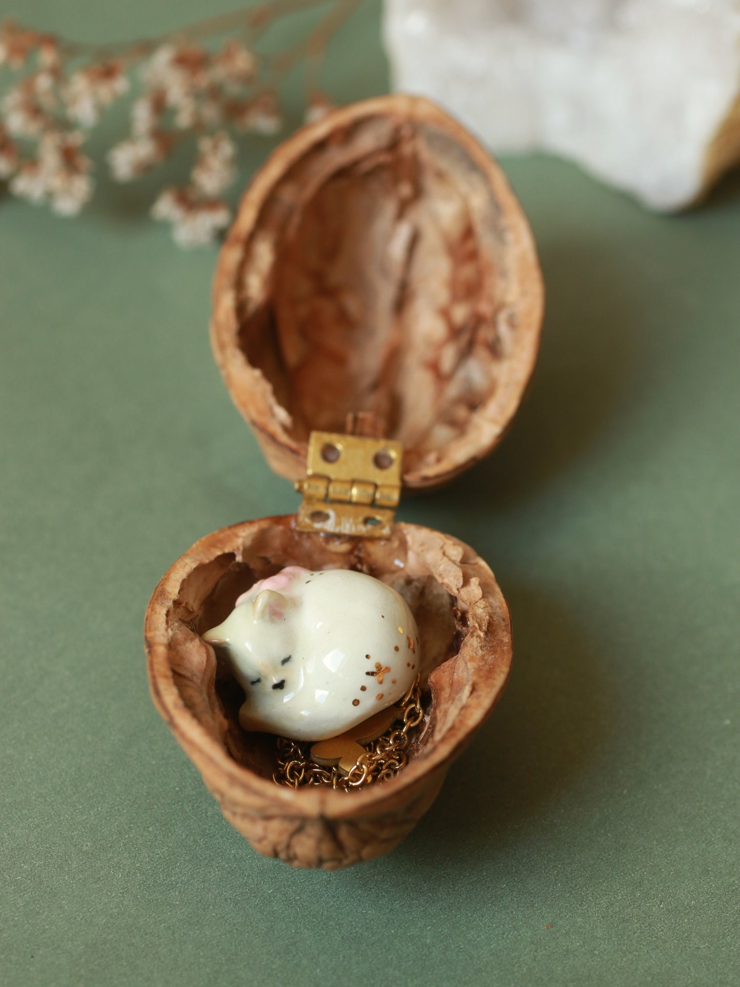 Sleeping cat necklace in a walnut box