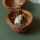 Tiny white cat necklace in a walnut box