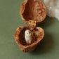 Barn owl necklace in a nutshell box