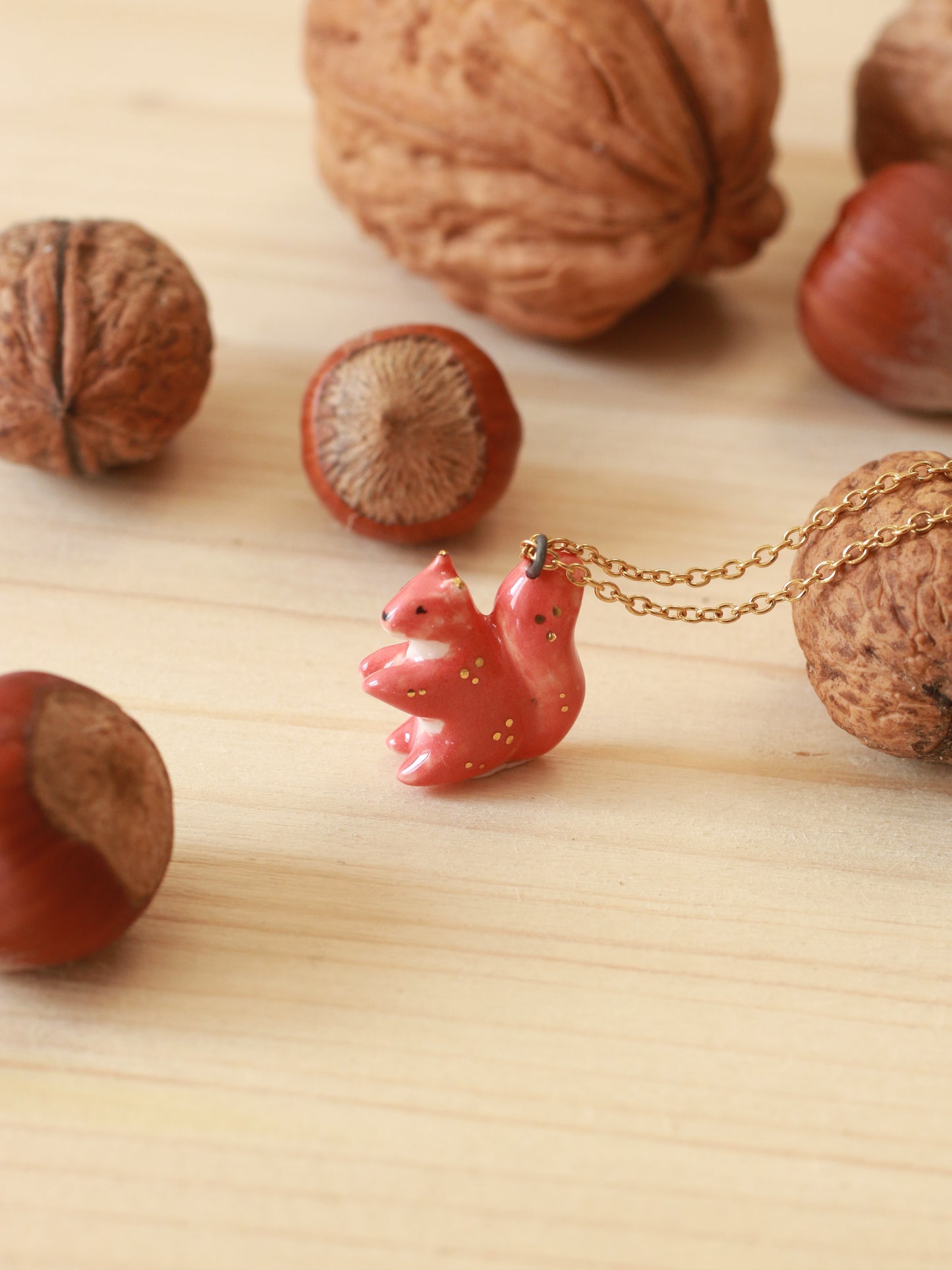 Ceramic squirrel necklace - 22k gold details