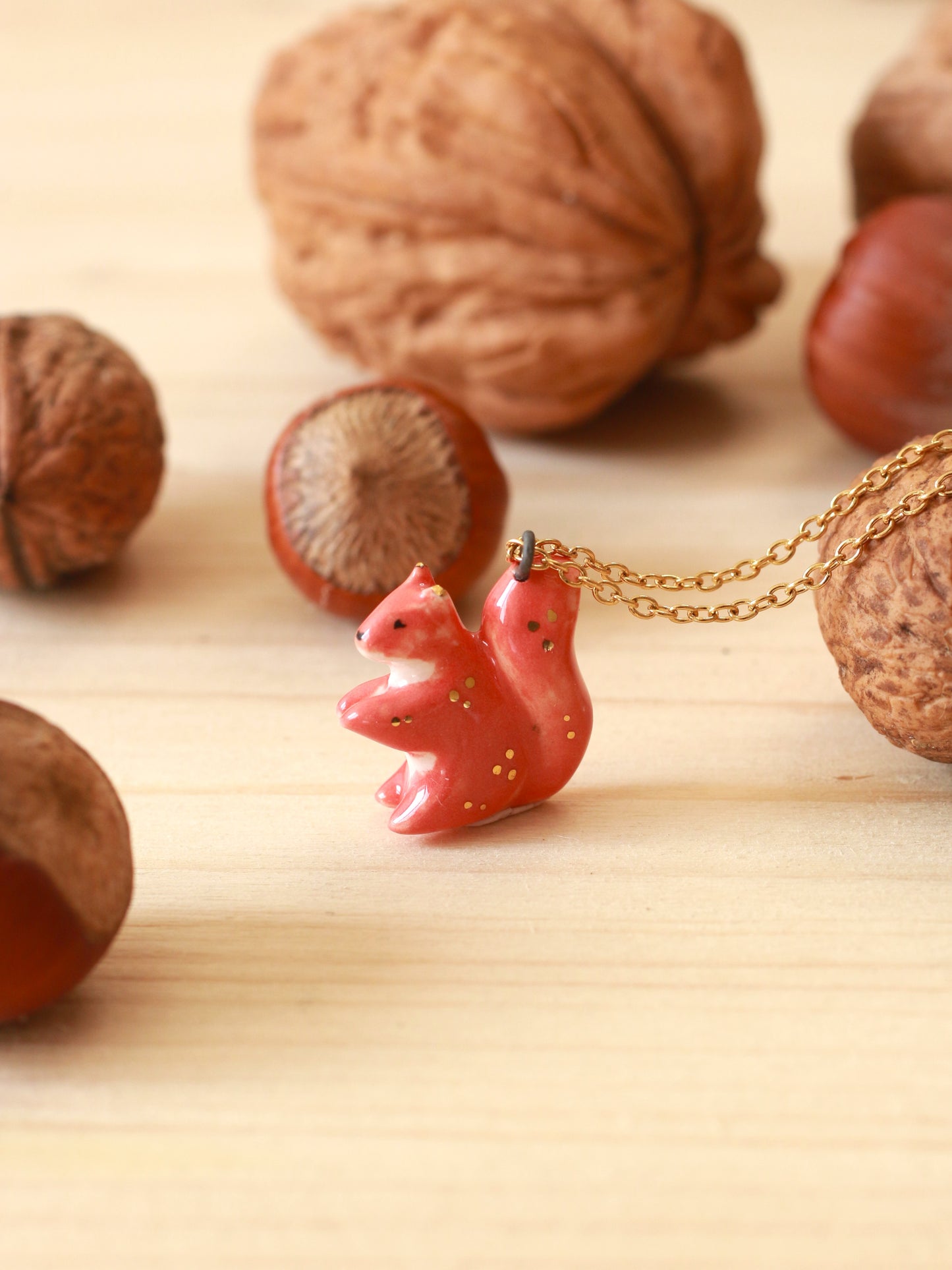 Ceramic squirrel necklace - 22k gold details