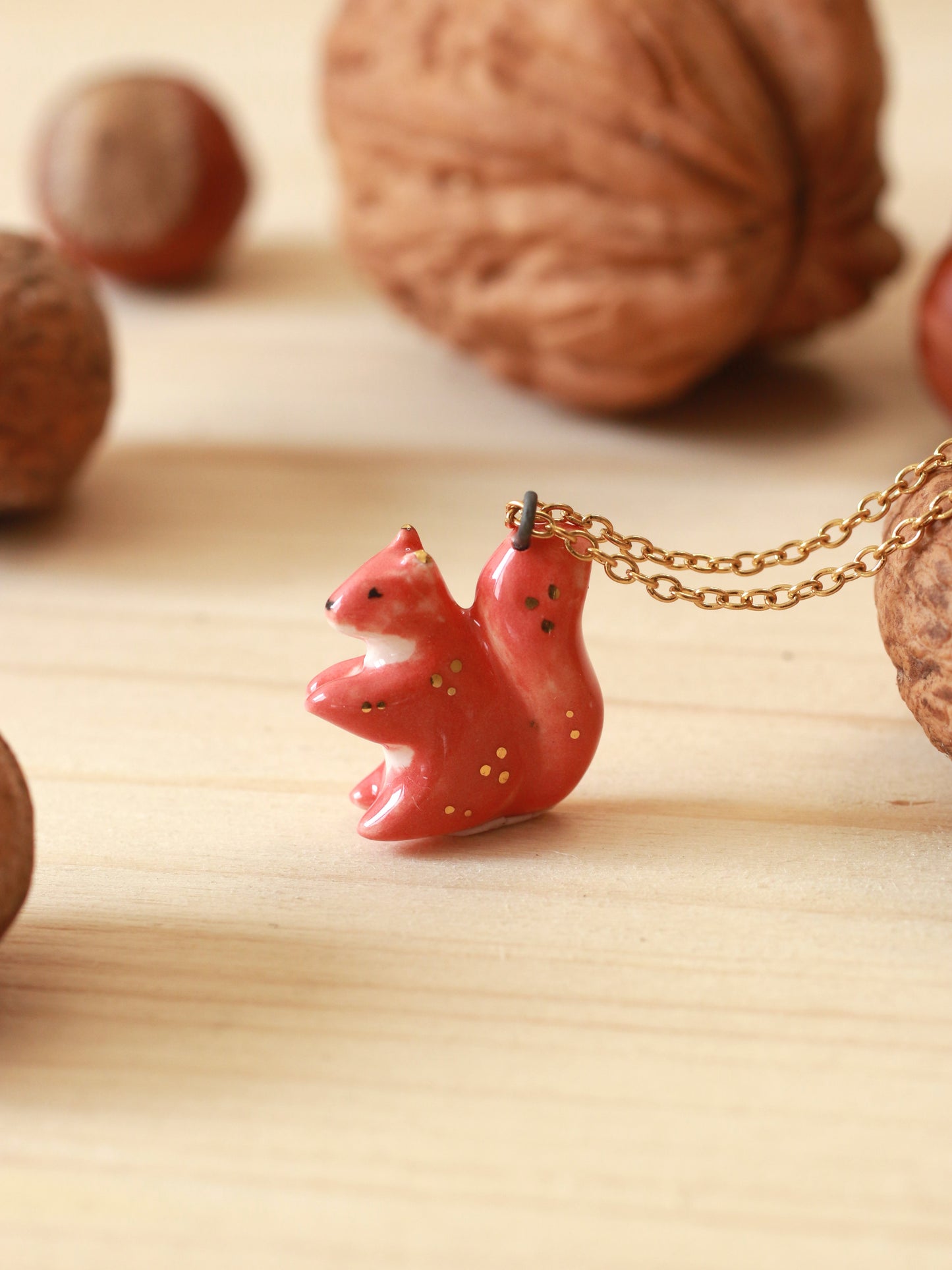 Ceramic squirrel necklace - 22k gold details