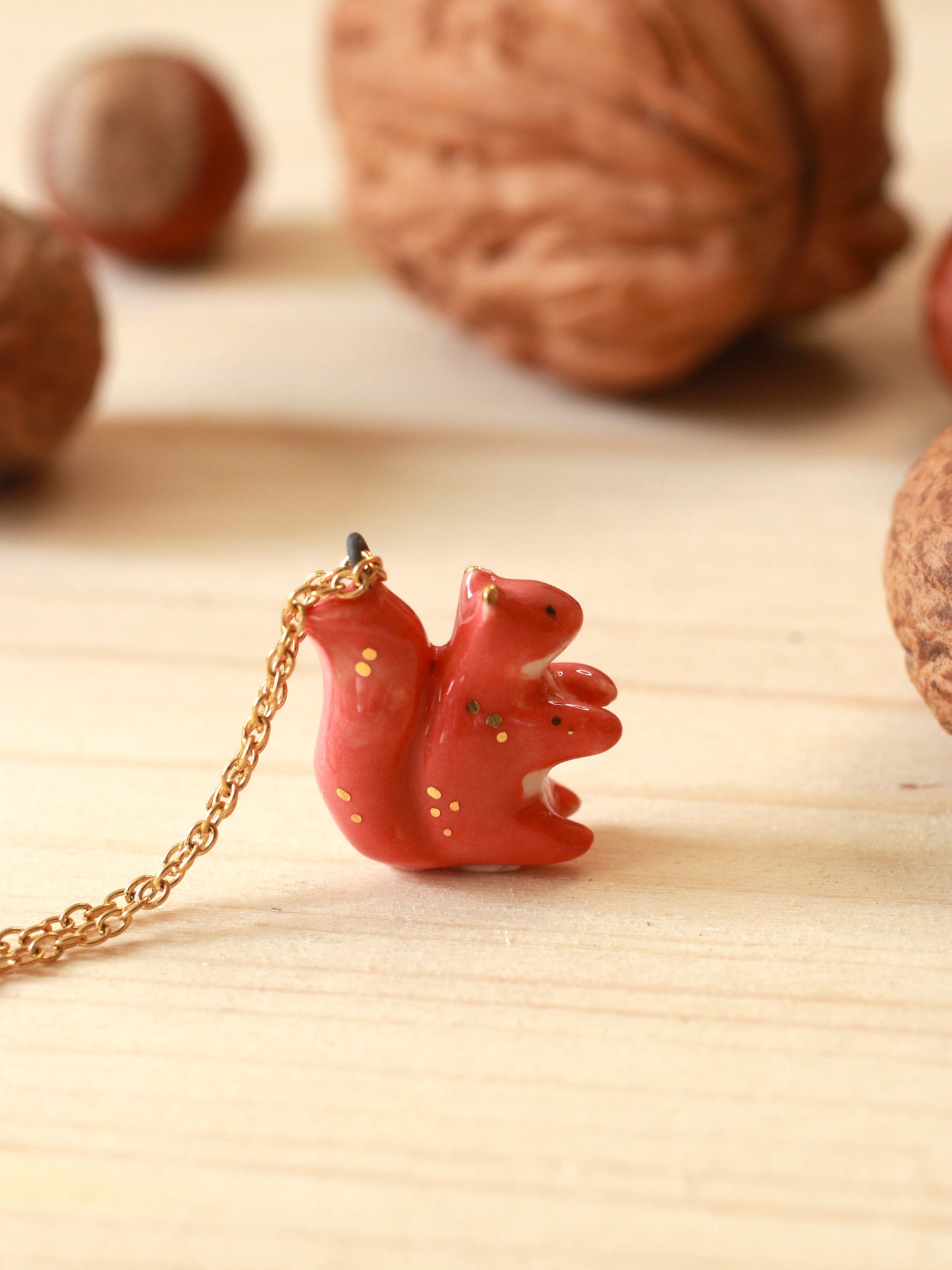 Ceramic squirrel necklace - 22k gold details