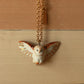 Barn owl necklace with a feather charm