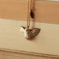 Barn owl necklace with a feather charm