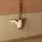 Barn owl necklace with a feather charm