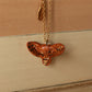 Barn owl necklace with a feather charm
